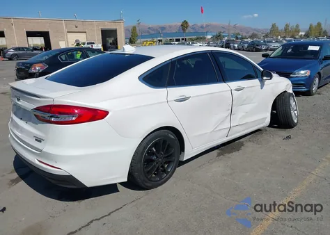 2020 Ford Fusion Plug-In Hybrid Titanium from USA, damaged, VIN 3FA6P0SU0LR181486
